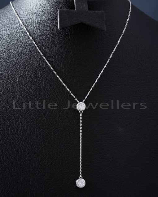 very feminine and chic delicate silver necklace, with two pendants that will accessorize your outfit and give it a modern touch.