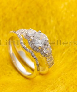 This magnificent sterling silver engagement ring with three brilliant stones is a wonderful gift for your loved one.