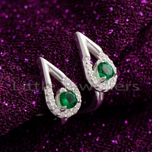 This month, treat yourself to a special piece of jewelry from our collection of lovely women's pear-shaped earrings. featuring a gorgeous green stone.