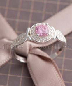 Express your love with this stunning pink halo engagement ring. She'll be captivated by its shimmer and shine, and you'll witness the delight on her face!