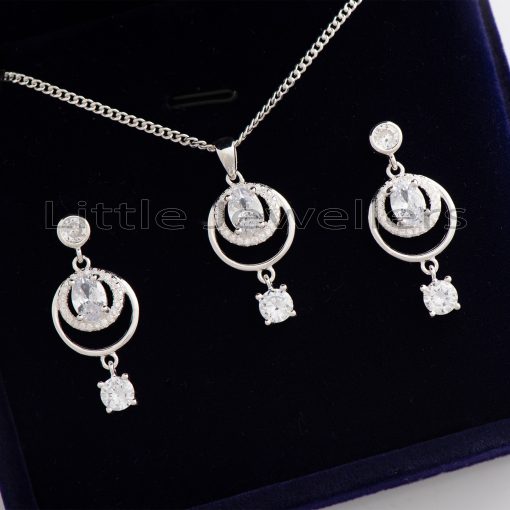 Add a touch of sparkle to your look with this chic sterling silver jewelry set. Perfect for any occasion, this set adds just the right amount of oomph to any casual outfit.