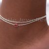 Bring a bit of elegance to your look with this exquisite sterling silver anklet! It has a sturdy double link chain with a dazzling red stone and is hypoallergenic, making it perfect for adding a statement to your style.