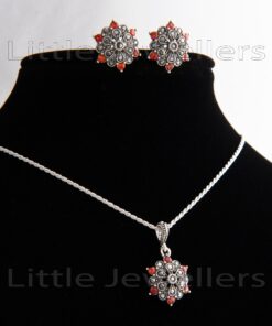 Add a touch of elegance to your wardrobe with this vintage-style, sterling silver jewellery for women. This stunning ruby and marcasite stone necklace set is the perfect timeless treasure.