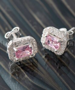 Add a pop of color to any outfit with these beautiful pink earrings for her. Made from hypoallergenic silver, they're encrusted with a pink zirconia stone & outlined with clear gems for extra sparkle