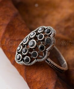 Make a stunning statement with this beautiful silver fashion ring. Its versatile black color pairs perfectly with any outfit & adds a touch of elegance to any occasion.