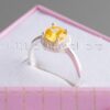 This Yellow Birthstone Ring boasts an exquisite round-cut Citrine stone that adds a touch of brilliance and warmth to her special day. This would make a perfect birthday gift for those born in November, bringing joy and radiance to their celebration.