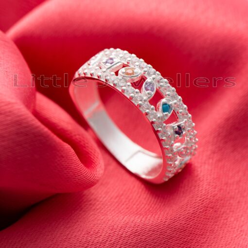 Accessorize your look with this eye-catching silver ring! Boasting a thick band and a vibrant array of multicolored gemstones, this jewelry piece is sure to brighten up any outfit.