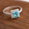Adorn yourself with this exquisite birthstone jewelry in Nairobi: a solid sterling silver ring featuring a vibrant blue gem and dazzling micro zirconia stones for an unforgettable look.