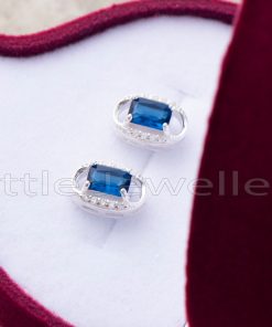 Celebrate your special day with these stunning sterling silver earrings, featuring a dazzling blue zirconia stone. The perfect anniversary gift to add a touch of sparkle and elegance!