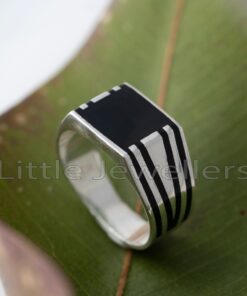 Get this unique silver jewellery for men featuring an edgy pattern with striking black stripes. Add this extraordinary silver men ring to your collection and experience the elegant flair it brings.