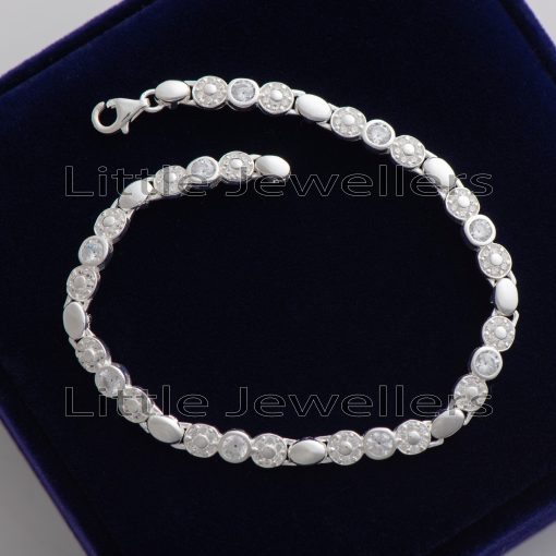 Celebrate your special day with this exquisite women's silver bracelet. The delicate design and sparkling zirconia stones make this piece of jewelry perfect for commemorating any unique milestone.