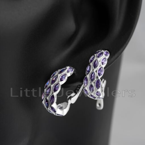 Add a touch of elegance to any ensemble with these stunning silver purple earrings. A unique design and exquisite craftsmanship make them one of a kind. Order now & bring your look to the next level.