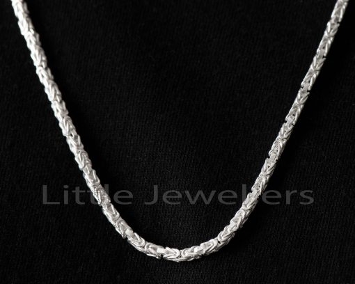 Discover a stylish addition to any man's wardrobe with our sterling silver Byzantine men's chain. Crafted for comfort and durability, this versatile piece is perfect for any occasion.