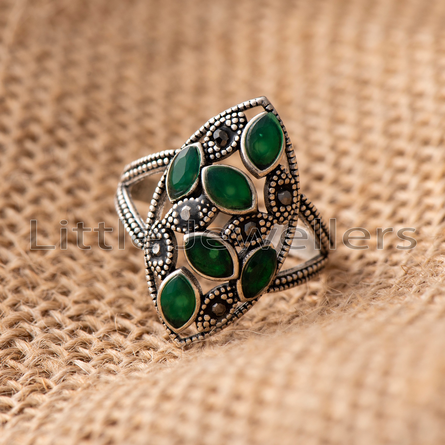 green cocktail ring