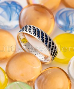 Sterling Silver Male Ring with Sapphire Blue Wave-Shaped Stones: A Symbol of Change, Resilience, and Opportunity