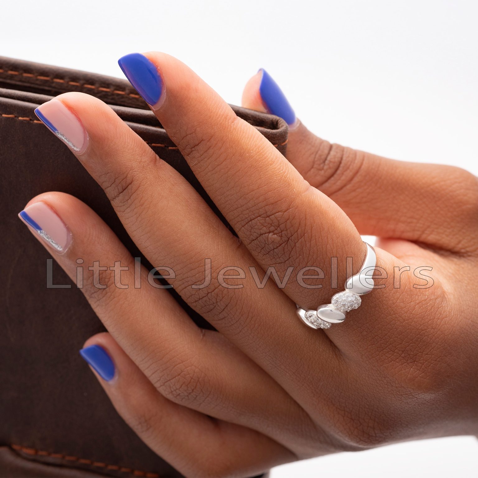 Introducing a perfect everyday ring that is not an engagement or wedding ring - the ideal choice for casual rings in Nairobi. Crafted from sterling silver and embellished with subtle zirconia stones.
