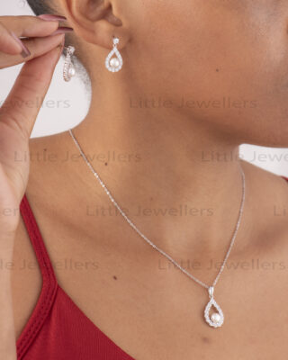 Sterling silver pearl jewelry set with matching earrings and pendant – perfect for weddings or gifts in Kenya
